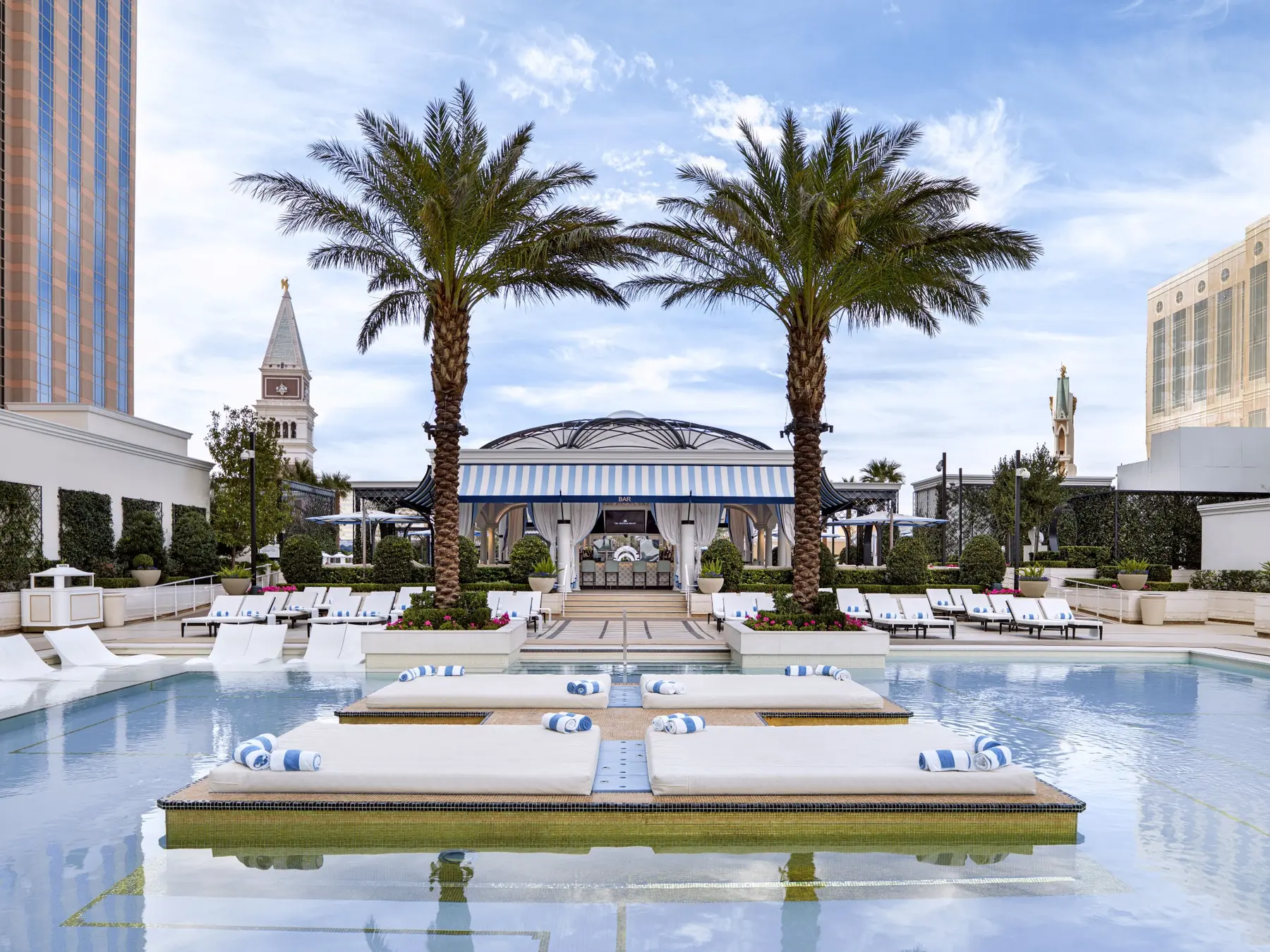 Palm-lined pool deck at The Venetian Resort Las Vegas